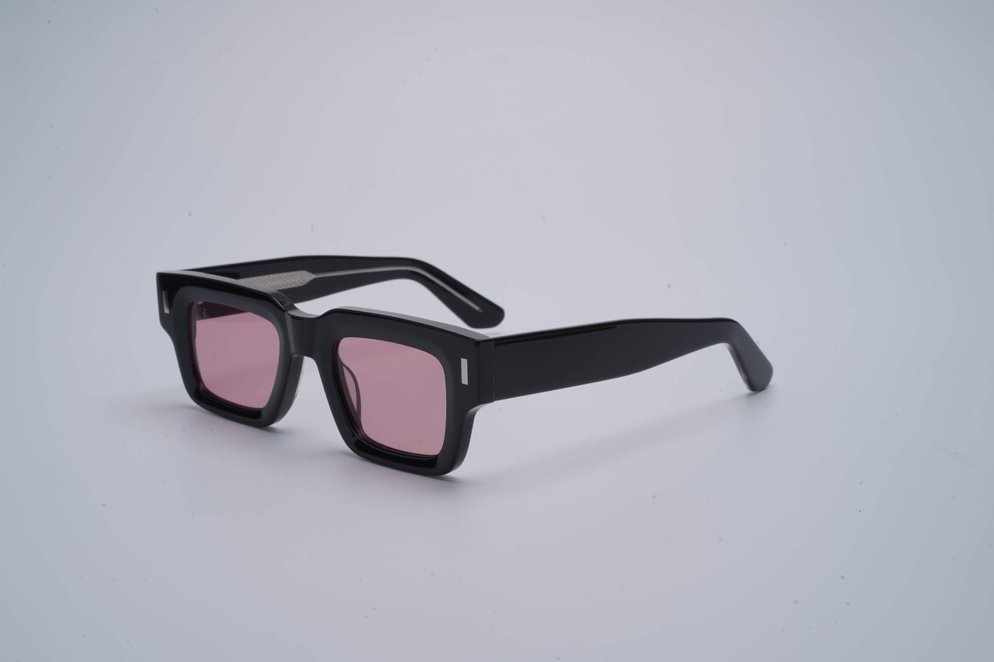 trimm life gladwin sunglasses with black frame and rose colored lenses