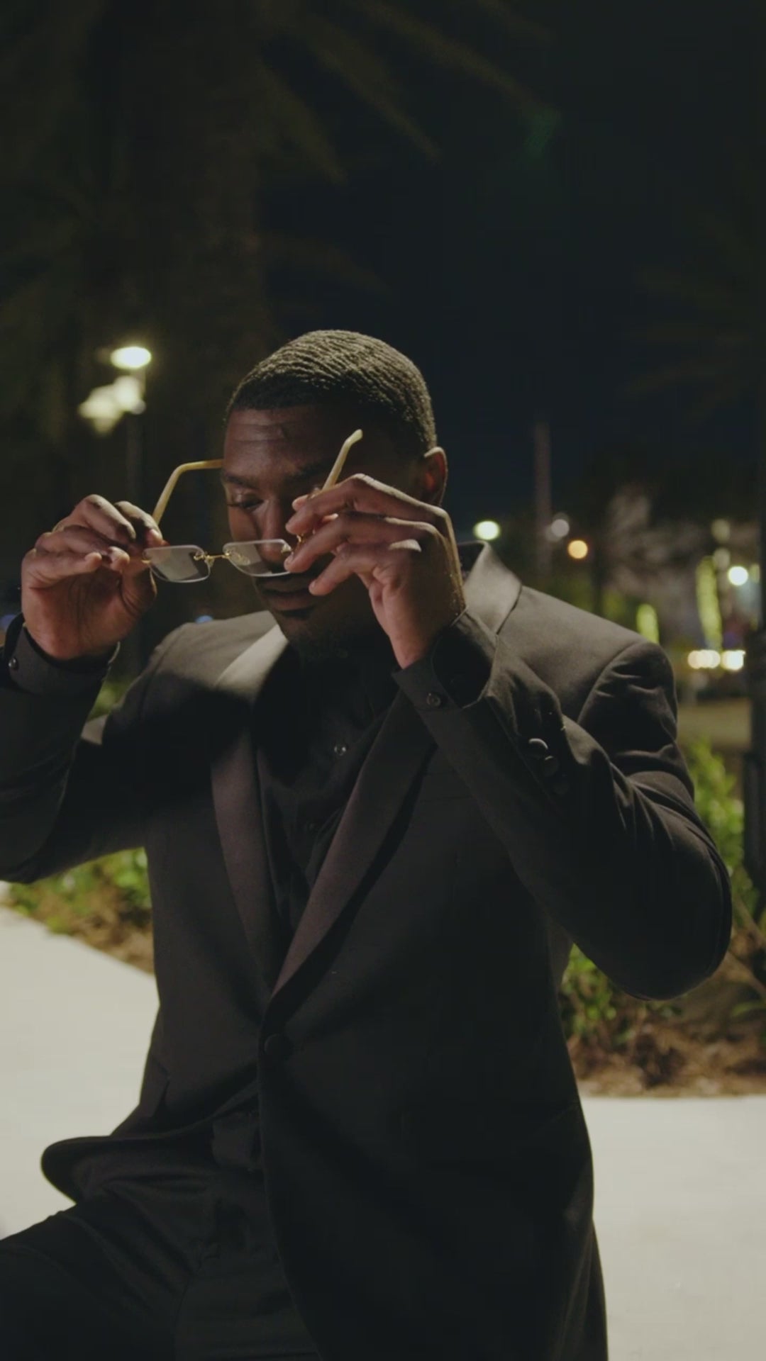 Load video: Loop video of models throwing shades to each other
